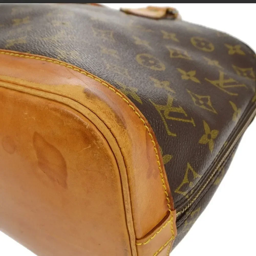 Louis Vuitton Alma Monogram Handbag - Picture 8 of 10